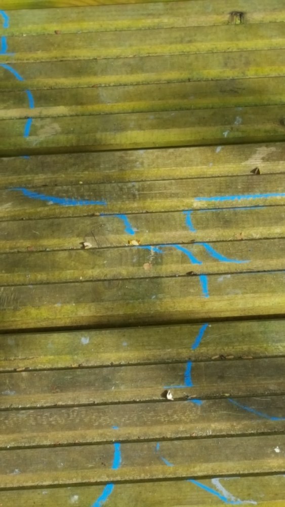 blue lines drawn on the decking